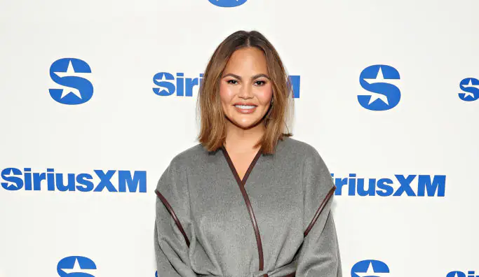 Chrissy Teigen claps back after being slammed for sharing a photo of her in the bath with her kids