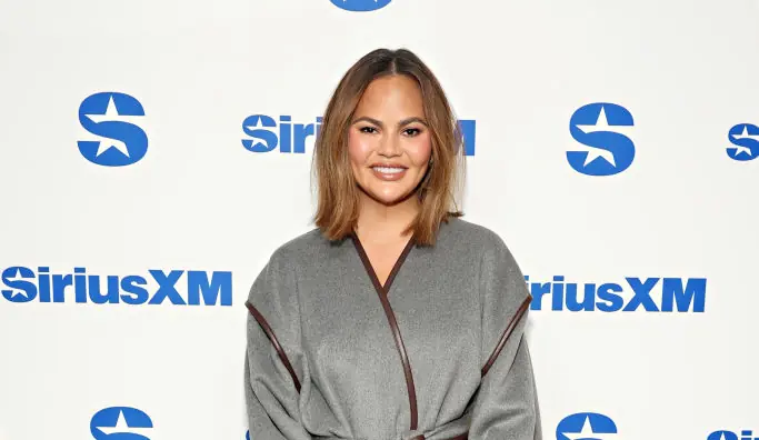 Chrissy Teigen claps back after being slammed for sharing a photo of her in the bath with her kids