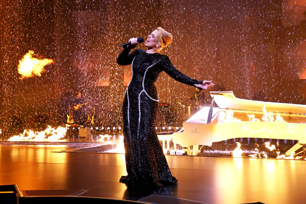 Adele breaks down in tears during live performance after spotting famous face in the audience