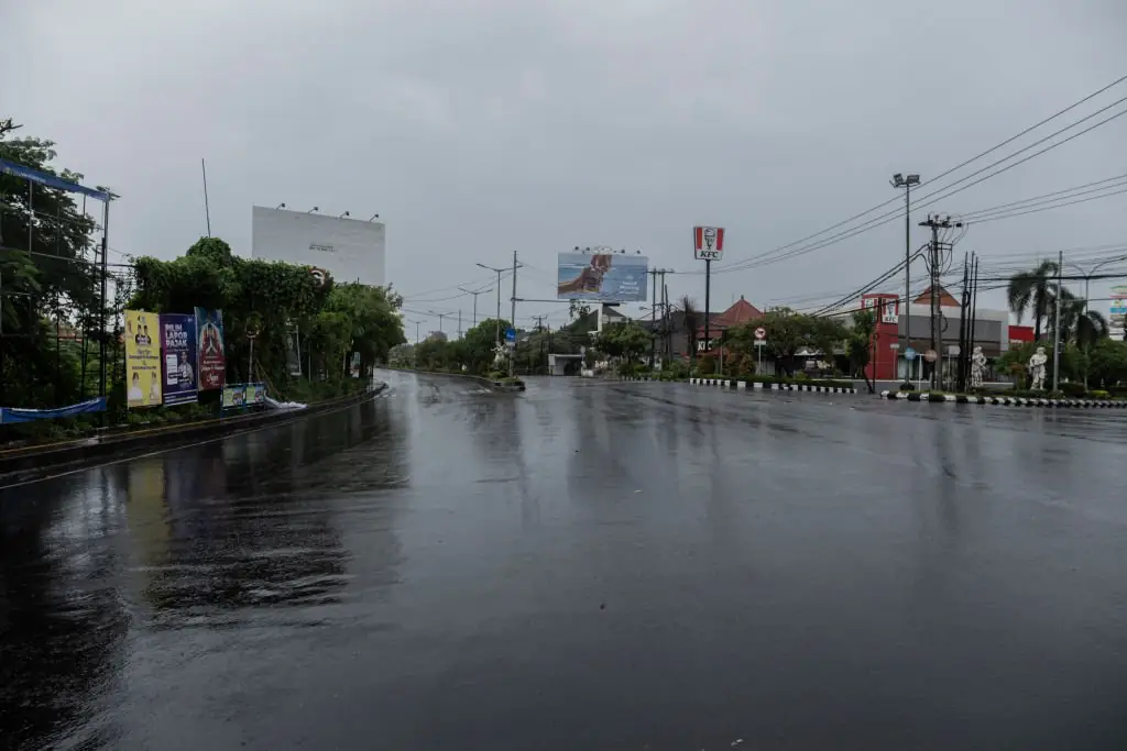 An empty street is seen during the day of silence of Nyepi Day in Jimbaran, Bali, Indonesia. Credit: Agung Parameswara / Getty