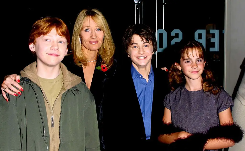 J.K. Rowling with Rupert Grint, Daniel Radcliffe, and Emma Watson. Credit: Gareth Davies / Getty