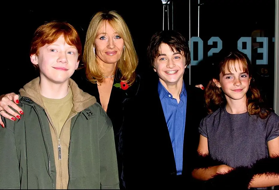 J.K. Rowling with Rupert Grint, Daniel Radcliffe, and Emma Watson. Credit: Gareth Davies / Getty