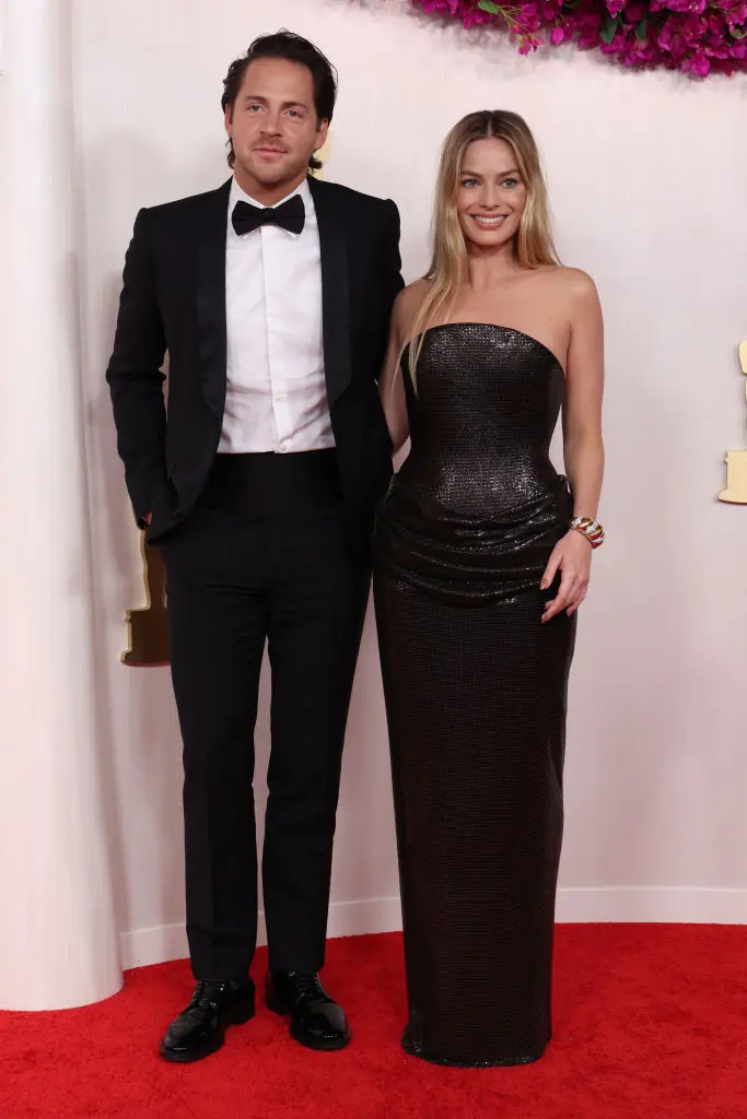 Tom Ackerley and Margot Robbie. Credit: Kevin Mazur / Getty