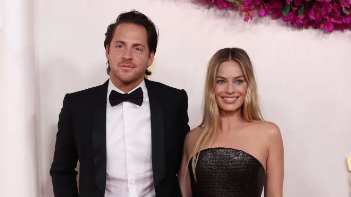 HOLLYWOOD, CALIFORNIA - MARCH 10: (L-R) Tom Ackerley and Margot Robbie attend the 96th Annual Academy Awards on March 10, 2024 in Hollywood, California. (Photo by Kevin Mazur/Getty Images)