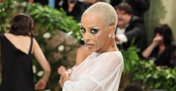 Doja Cat turns heads on the Met Gala red carpet as she dons a soaking wet t-shirt dress