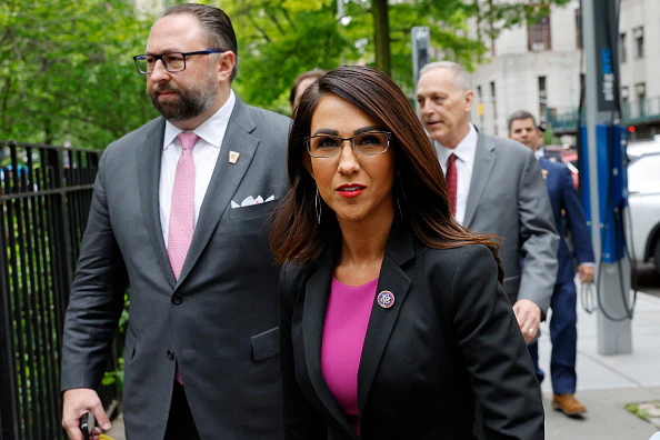 Lauren Boebert was caught getting handsy with a man in public, in surveillance footage from 2023. Credit: Michael M. Santiago/Getty Images.
