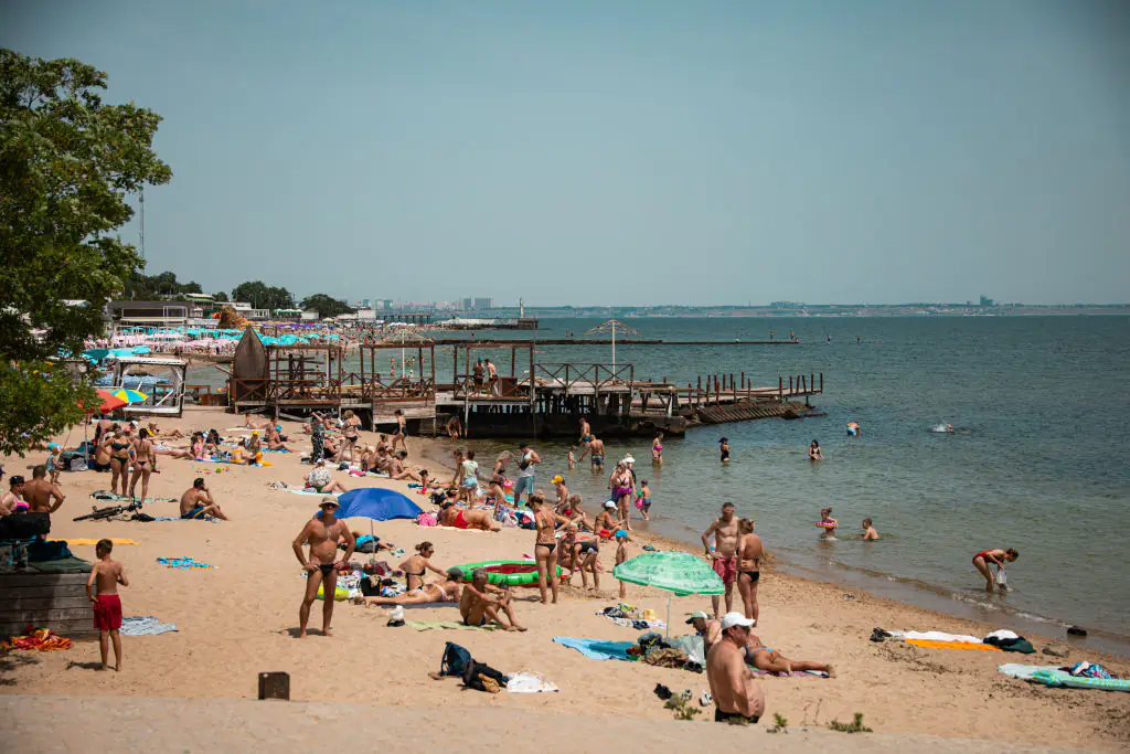 Everything we know as three swimmers are killed by sea mines that washed onto beach