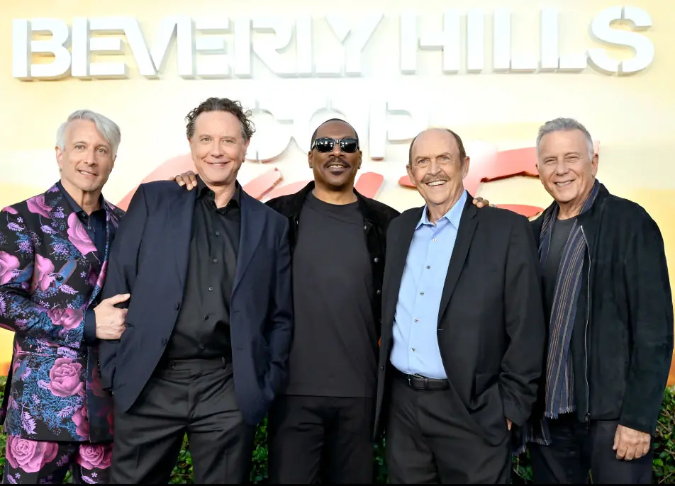 Ashton with the cast of Beverly Hills Cop: Axel F. Credit: John Sciull / Getty