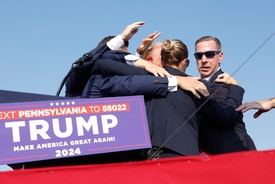One reportedly dead at Trump rally as bleeding former president is rushed off stage amid shooting