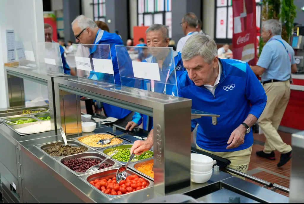 Peaty said the lines were extremely long while waiting for food. Credit:  David Goldman - Pool/Getty