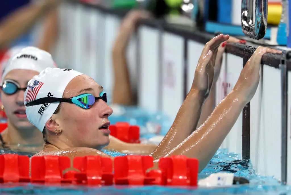 Man with 'dad bod' in brightly-colored Speedos steals the show at Paris Olympics as viewers dub it 'funniest moment'