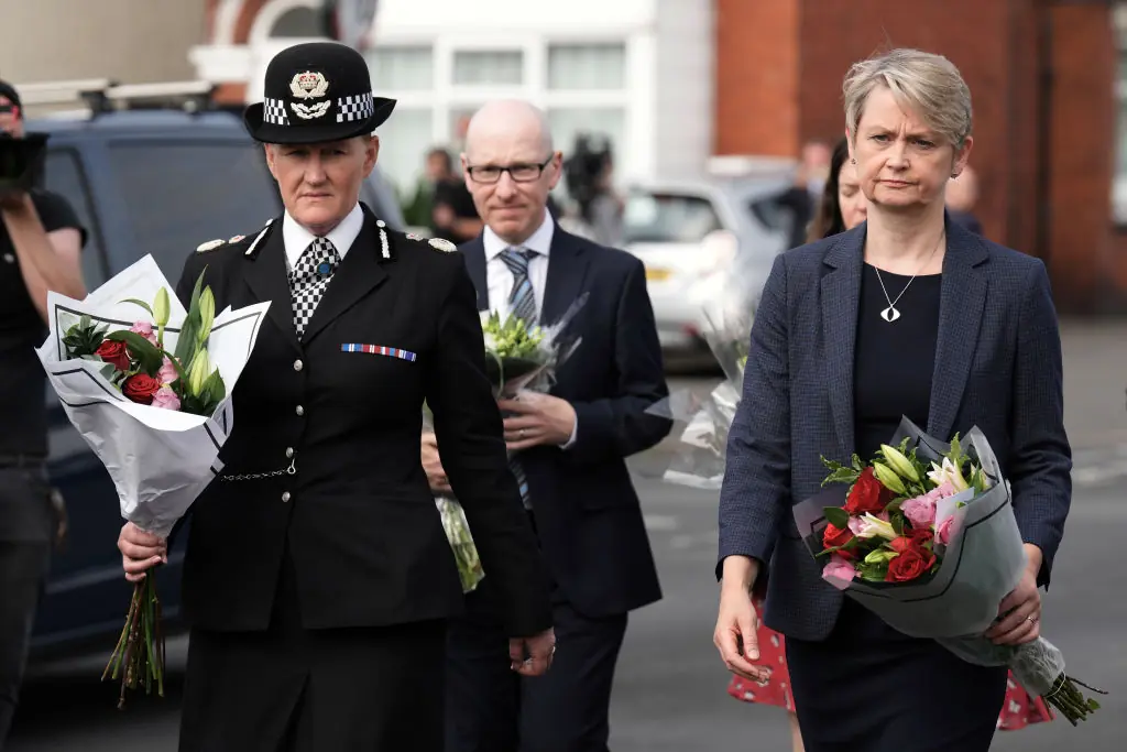 Yvette Cooper, the Secretary of State for the Home Department, came to lay flowers at the scene. Credit: Christopher Furlong/Getty