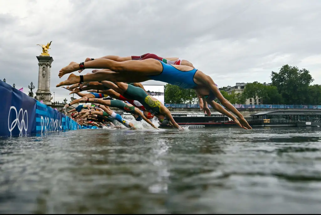 The triathlon event had to be canceled yesterday due to the polluted waters of the Seine. Credit: Martin Bureau - Pool/Getty
