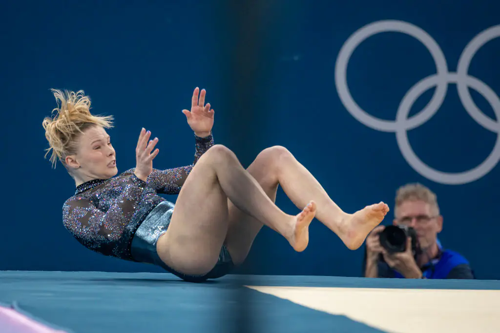 Carey lost her footing and fell at the conclusion of her floor routine during Artistic Gymnastics. Credit: Tim Clayton/Corbis/Getty