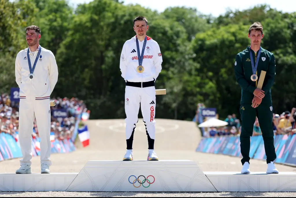 Gold medalist Thomas Pidcock of Team Great Britain (C), Silver medalist Victor Koretzky of Team France (L) and Bronze medalist Alan Hatherly of Team South Africa.Credit: Alex Broadway / Getty