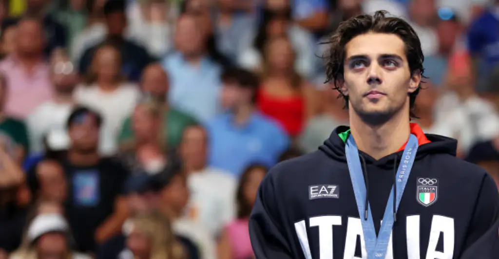 Olympic gold medallist is seen sleeping in Paris park after complaining about accommodation conditions