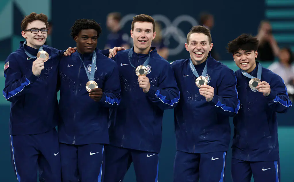 Paul Juda, Frederick Richard, Stephen Nedoroscik, Brody Malone and Asher Hong of Team United States clinched the bronze medals at the 2024 Olympics. Credit: Naomi Baker/Getty