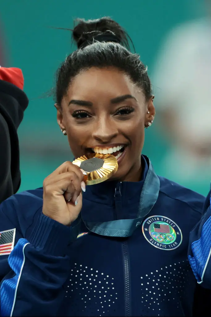 She is now the most-decorated American gymnast in history. Credit: Jean Catuffe/Getty Images