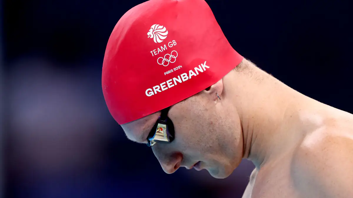 Olympics swimmer collapses to the floor after being disqualified over ...