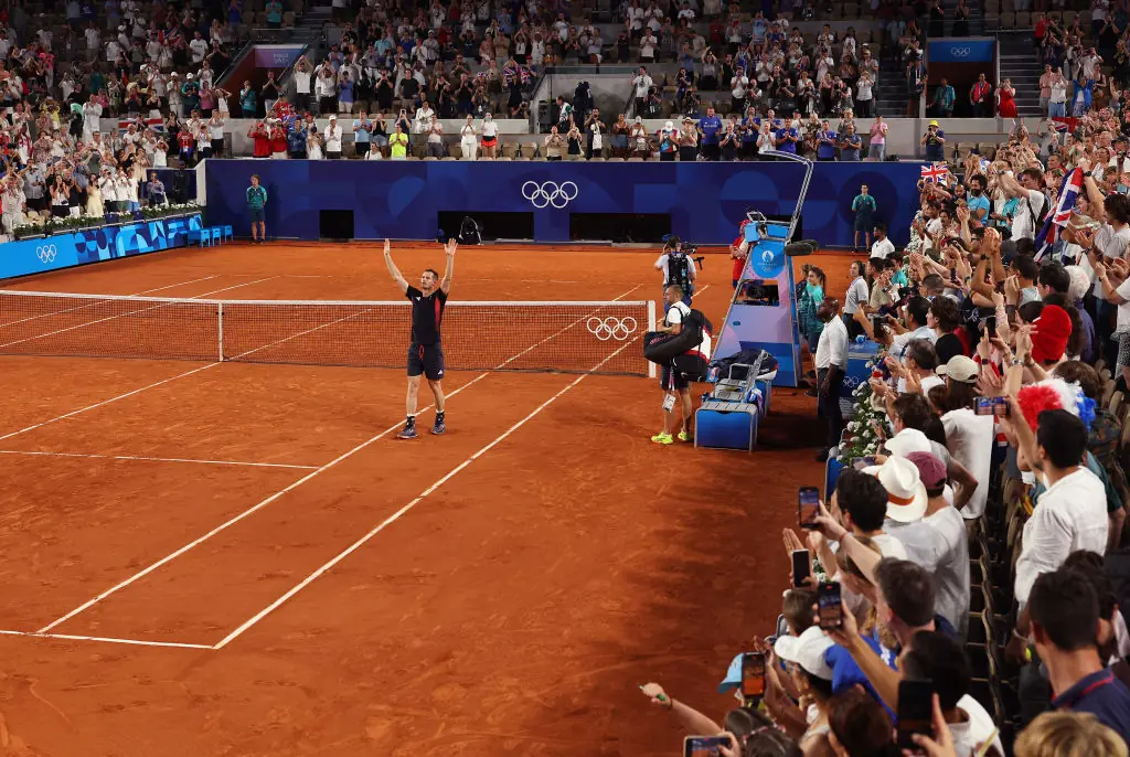 Andy Murray of Team Great Britain acknowledges the crowd one last time after his doubles loss Credit: Julian Finney/Getty  