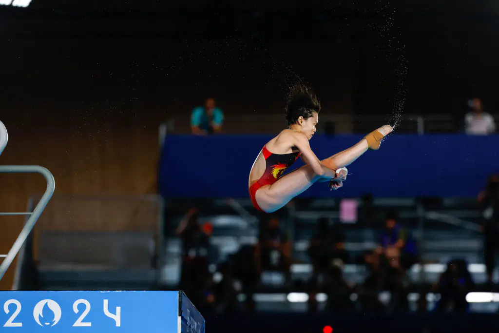 Quan secured herself a perfect score for her first dive. Credit: Antonio Martinez/Europa Press/Getty