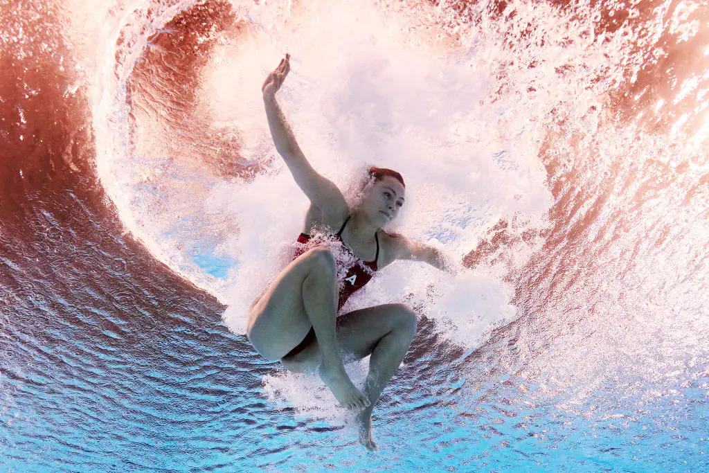 Despite her injury, Gibson continued with the rest of her dives. Credit: Adam Pretty/Getty