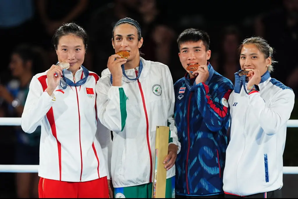 Khelif with silver medalist Yang Liu, bronze medalists Janjaem Suwannapheng and Chen Nien Chin. Credit: China News Service / Getty