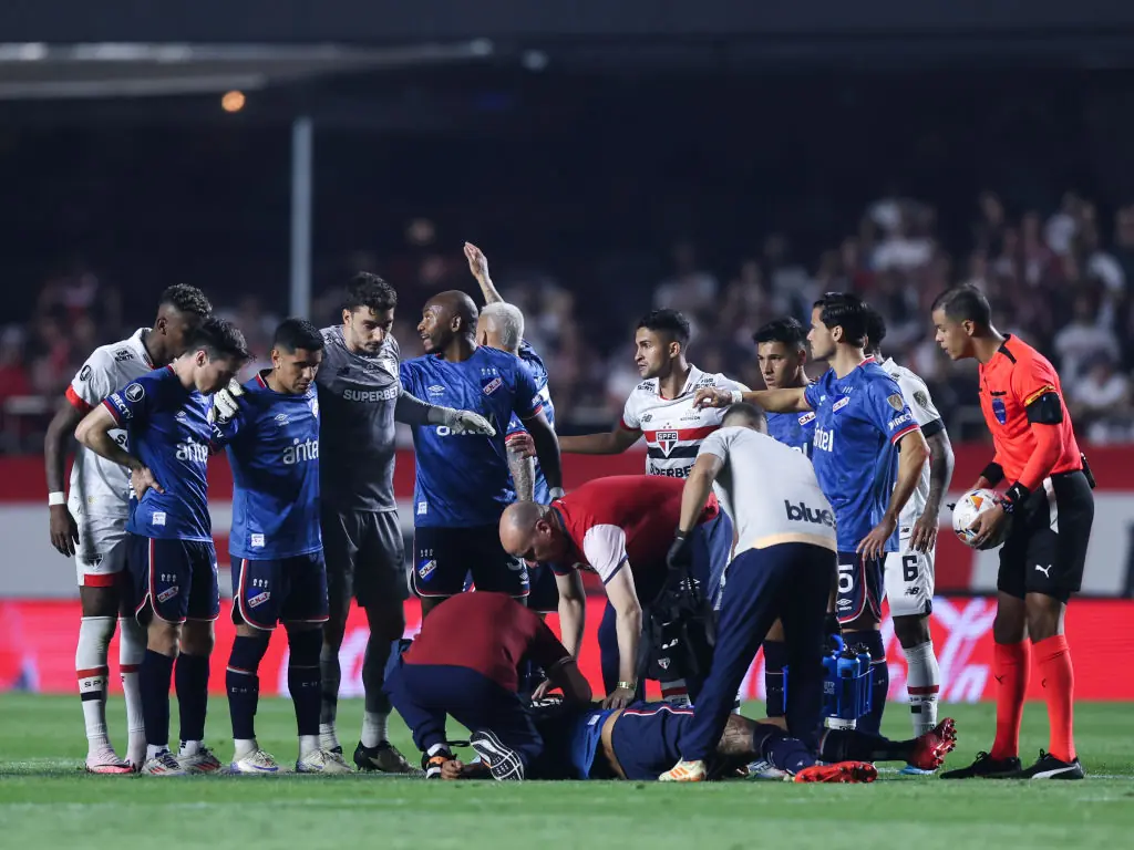 Medical teams rushed to his aid. Credit: Alexandre Schneider/Getty