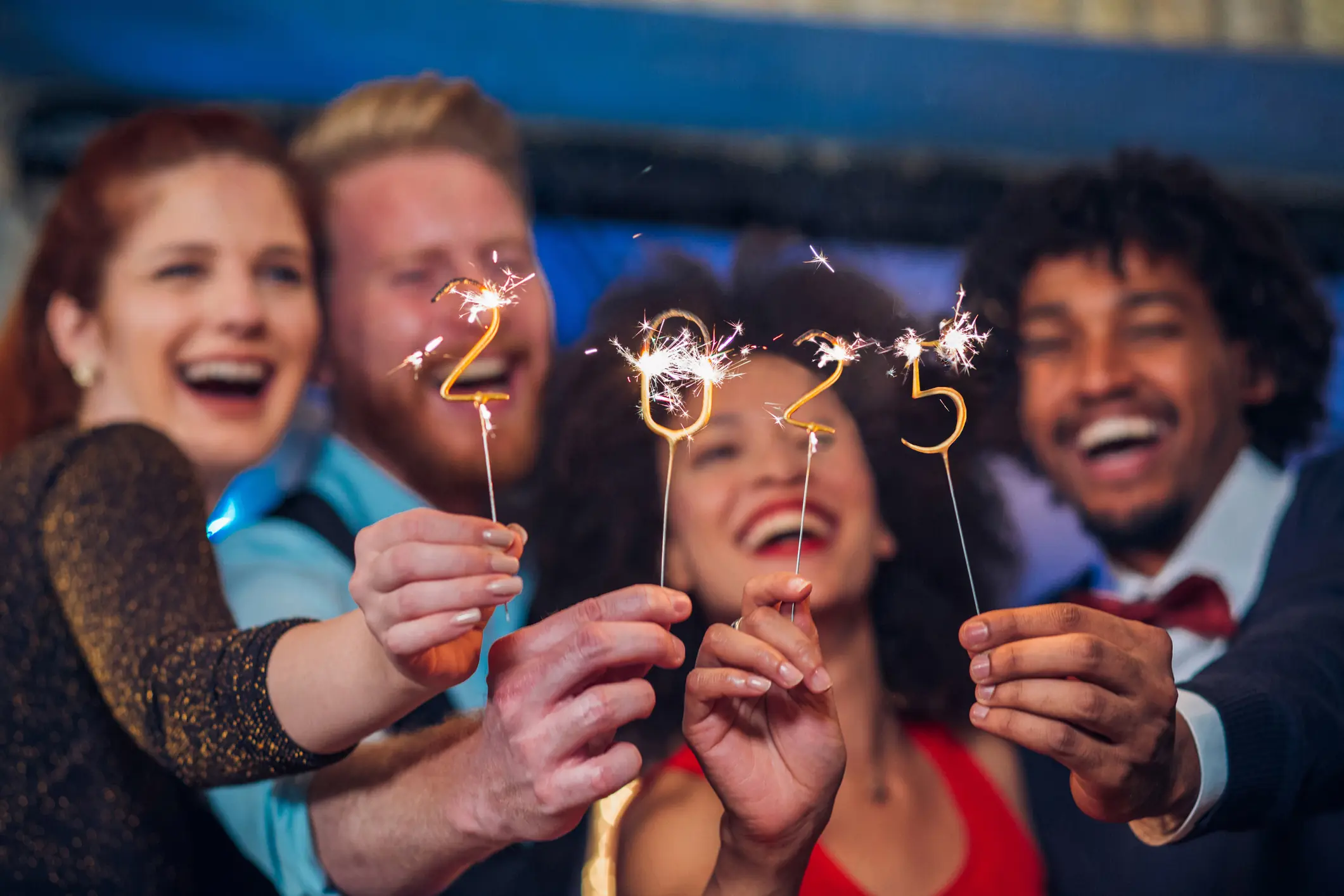 Chances are, you'll be singing 'Auld Lang Syne' when it strikes midnight on December 31. Credit: RgStudio/Getty Images