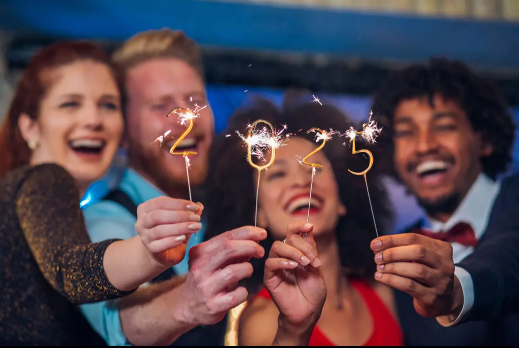 Chances are, you'll be singing 'Auld Lang Syne' when it strikes midnight on December 31. Credit: RgStudio/Getty Images