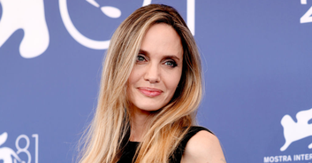 Angelina Jolie brought to tears at film festival during 8-minute standing ovation amid bitter dispute with Brad Pitt