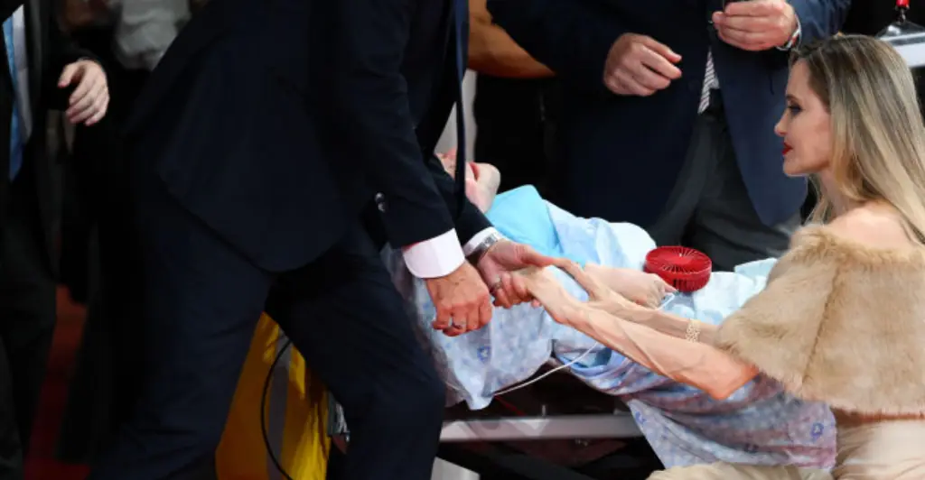 Angelina Jolie spends time with fan battling rare bone disorder at Venice International Film Festival