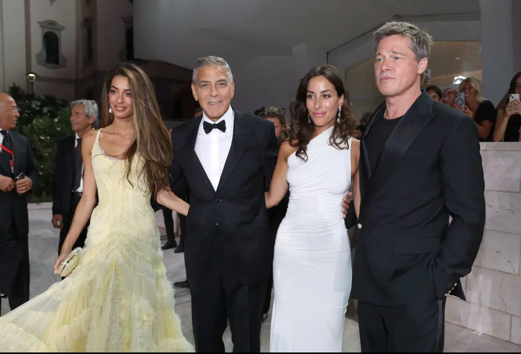 Amal Clooney, George Clooney, Brad Pitt and Ines de Ramon attend the "Wolfs" red carpet during the 81st Venice International Film Festival. Credit: Pascal Le Segretain/Getty 