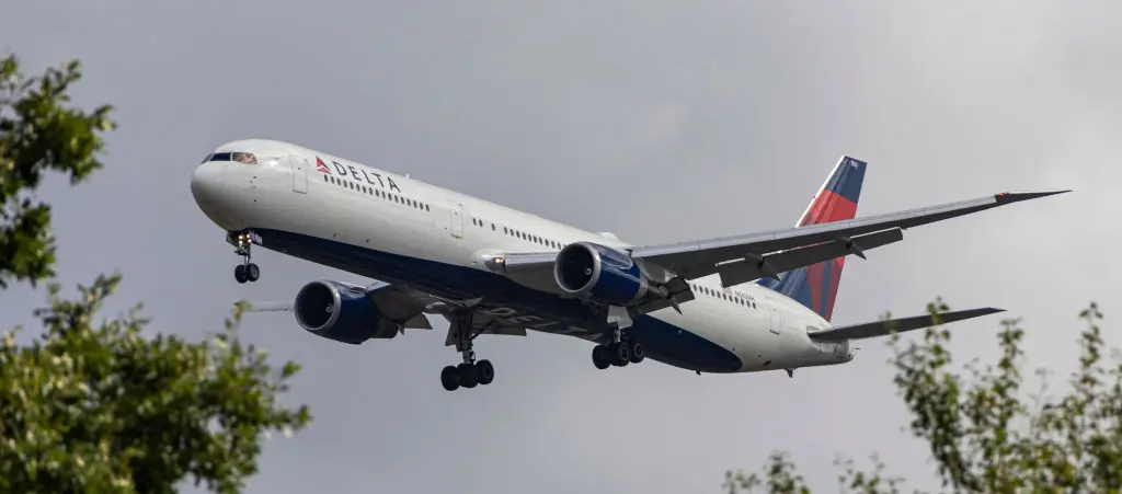 Flap from wing of Delta airlines plane plummets onto driveway of North Carolina home and crew was unaware 'until landing'