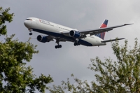 Flap from wing of Delta airlines plane plummets onto driveway of North Carolina home and crew was unaware 'until landing'