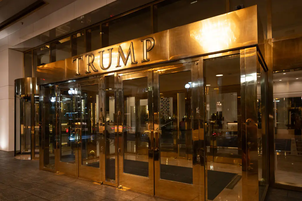 Woman dies after being 'violently ejected by revolving door at Trump hotel', family says