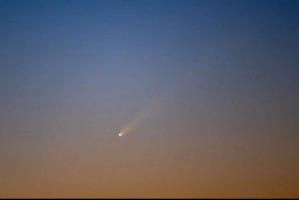 Comet C/2023 A3 (TsuchinshanATLAS) known also as "the comet of the century" is seen crossing the sky during sunrise at Monfrague National Park. Credit: Marcos del Mazo/LightRocket/Getty