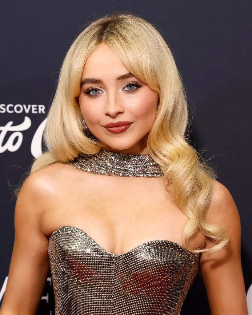 Sabrina Carpenter's awkward onstage exchange with a fan during her Coachella headlining set sparked backlash online. Credit:  Taylor Hill / Getty