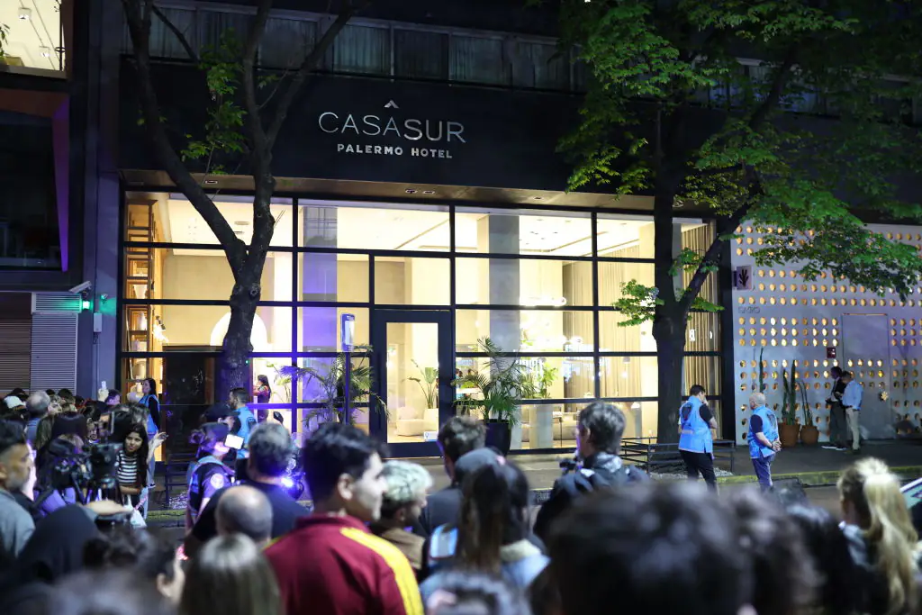 People gathered outside of the CasaSur Palermo Hotel. Credit: Tobias Skarlovnik/Getty
