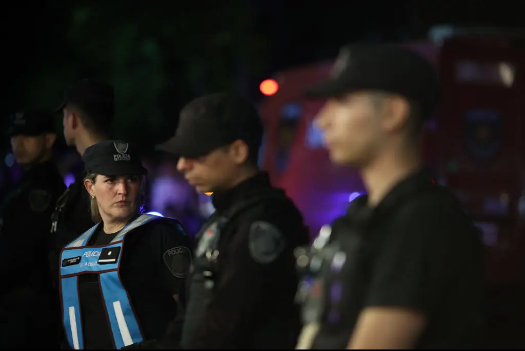 Police officers gather outside fo the hotel. Credit: Anadolu / Getty