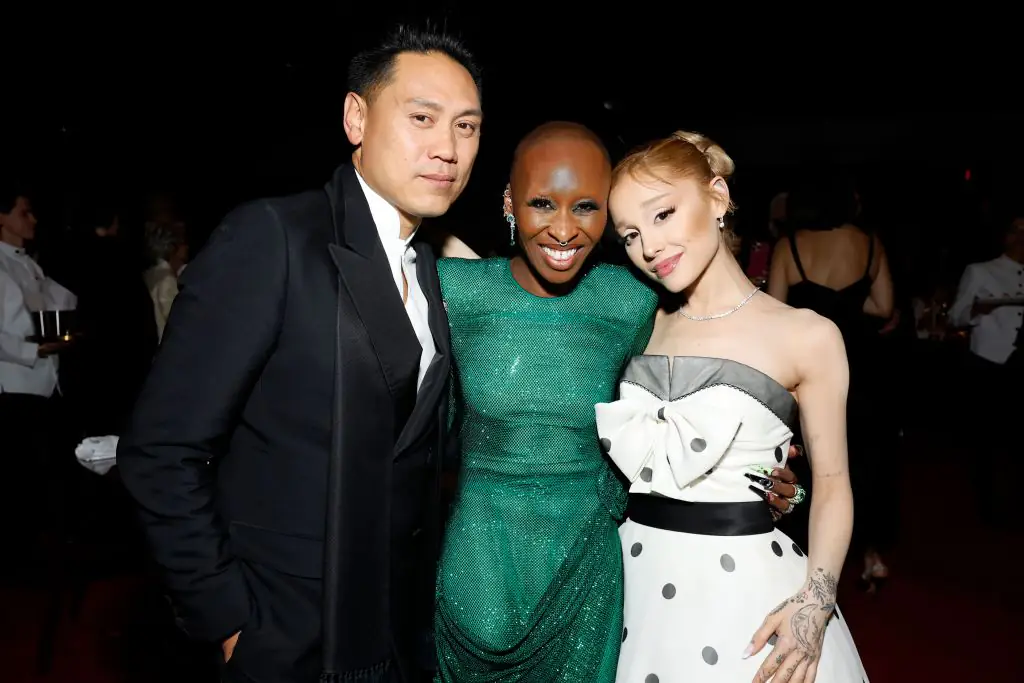 Cynthia Erivo, and Ariana Grande with Wicked director Jon M. Chu. Credit: Emma McIntyre / Getty