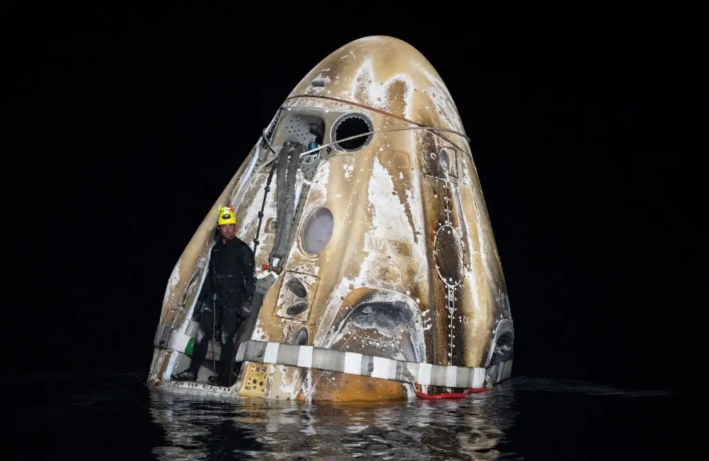 The SpaceX Dragon Endeavour spacecraft after splashdown. Credit: Joel Kowsky/NASA/Getty