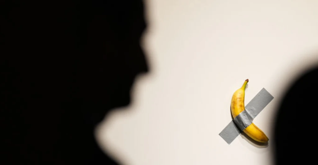 Infamous artwork of banana taped to wall sells for $6.24 million at auction