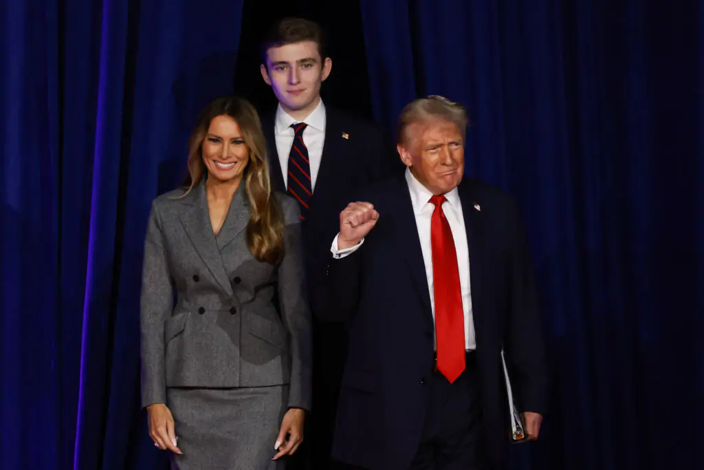 Barron Trump towers over his mother and father, Melania and Donald. Credit: Joe Raedle / Getty
