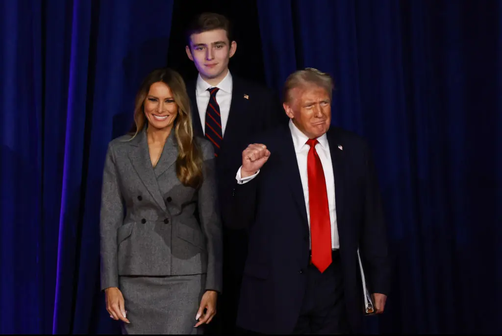 Barron Trump towers over his mother and father, Melania and Donald. Credit: Joe Raedle / Getty