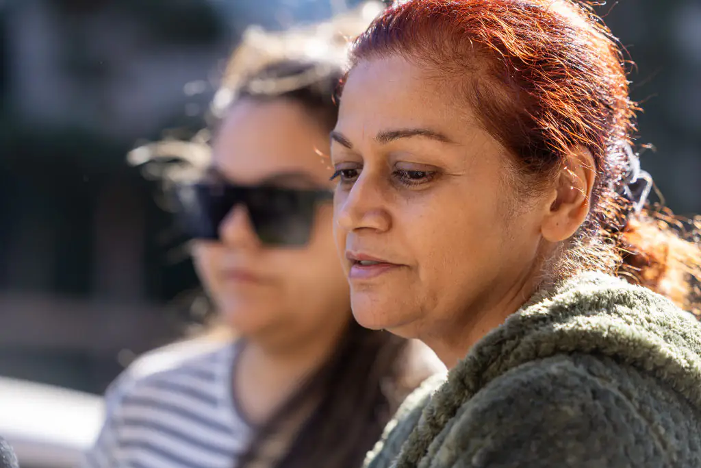 Judy Singh speaks during a press conference about her 