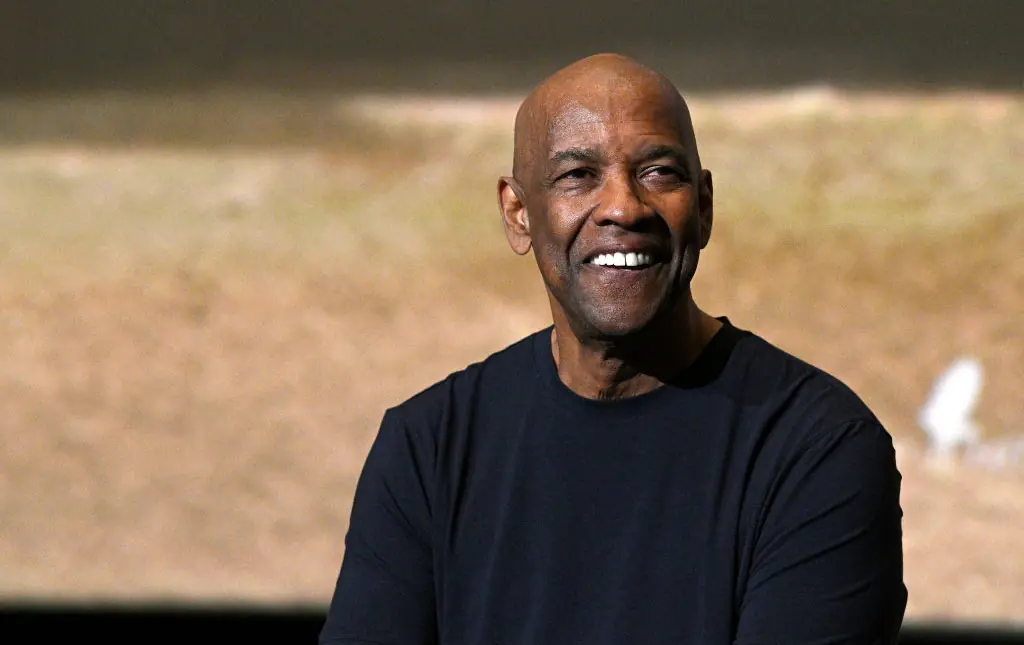 Denzel Washington gets baptized and becomes a minister