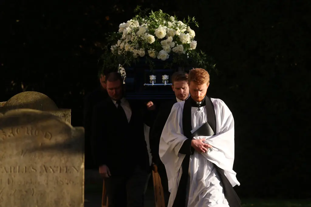 Liam Payne was laid to rest in a blue coffin bedecked with a white floral spray. Credit: Dan Kitwood/Getty Images