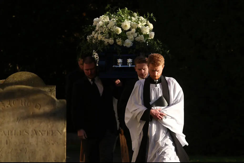 Liam Payne was laid to rest in a blue coffin bedecked with a white floral spray. Credit: Dan Kitwood/Getty Images