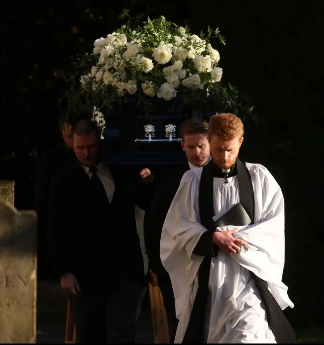Liam Payne was laid to rest in a blue coffin bedecked with a white floral spray. Credit: Dan Kitwood/Getty Images